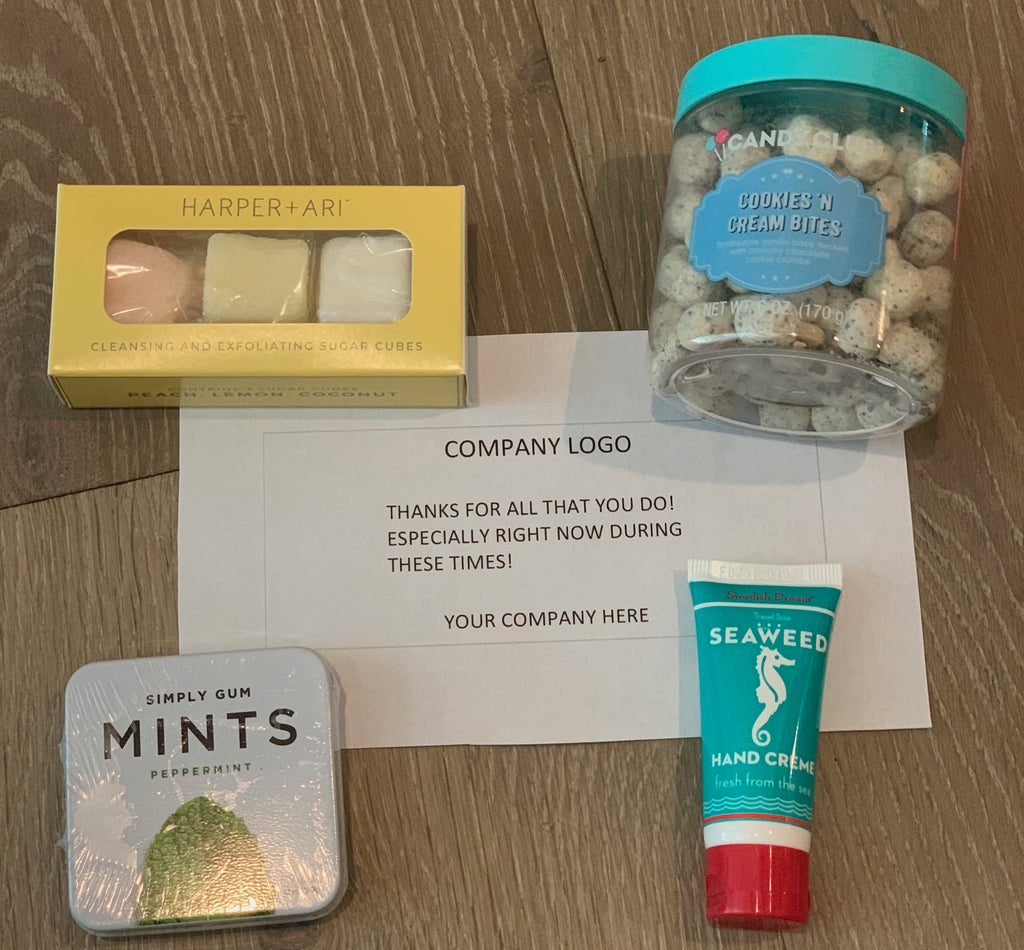 Corporate care package including sugar scrub cubes, cookies and cream bites, seaweed hand cream, and mints from Diament Jewelry, a gift shop in Washington, DC.