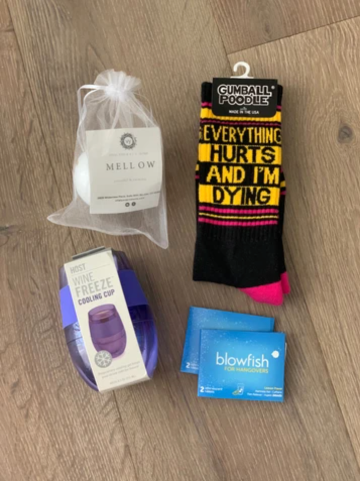 Funny and wine themed care package with bath bomb, socks, wine glass, and hangover cure from Diament Jewelry, a gift shop in Washington, DC.