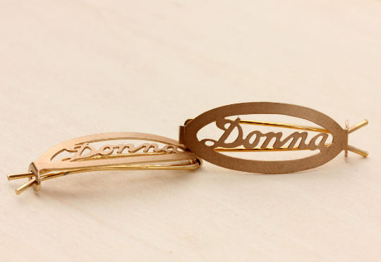 Vintage Donna gold hair clips from Diament Jewelry, a gift shop in Washington, DC.