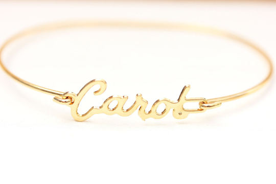Vintage Carol gold name bracelet from Diament Jewelry, a gift shop in Washington, DC.