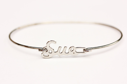 Vintage Sue silver name bracelet from Diament Jewelry, a gift shop in Washington, DC.