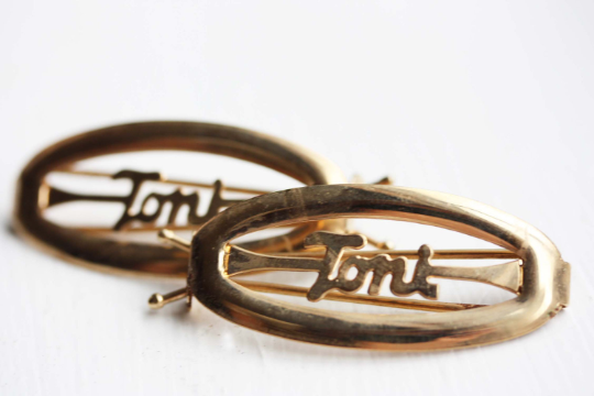 Vintage Toni gold hair clips from Diament Jewelry, a gift shop in Washington, DC.