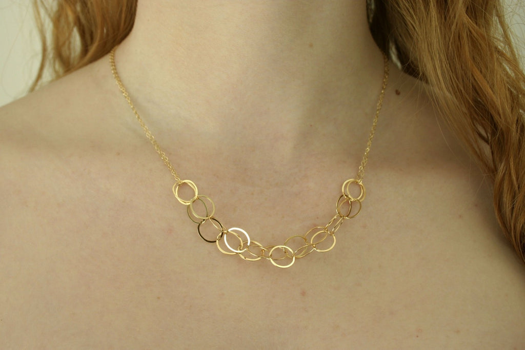 Delicate gold circles necklace from Diament Jewelry, a gift shop in Washington, DC.
