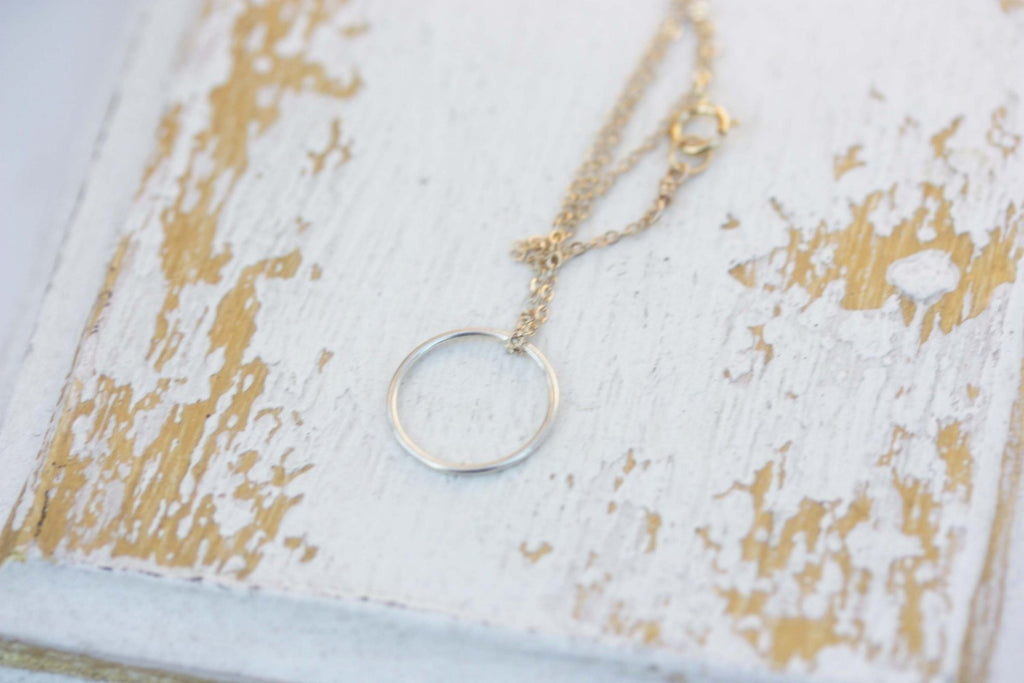 Delicate silver circle necklace from Diament Jewelry, a gift shop in Washington, DC.