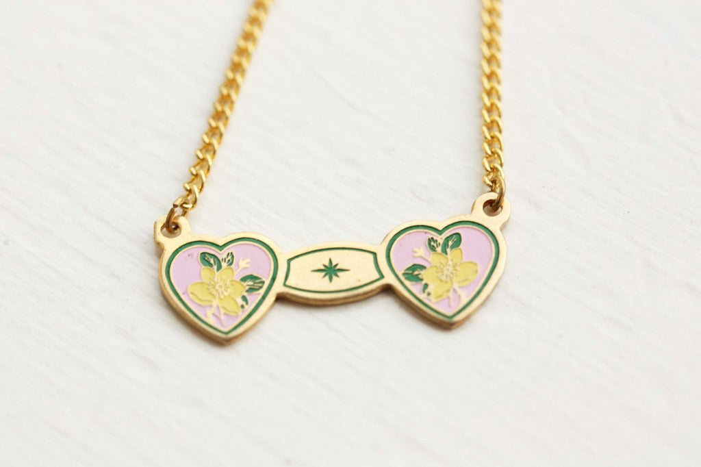 Double heart pink green yellow and gold necklace from Diament Jewelry, a gift shop in Washington, DC.