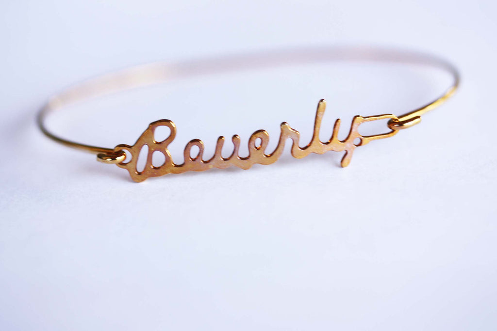 Vintage Beverly gold name bracelet from Diament Jewelry, a gift shop in Washington, DC.