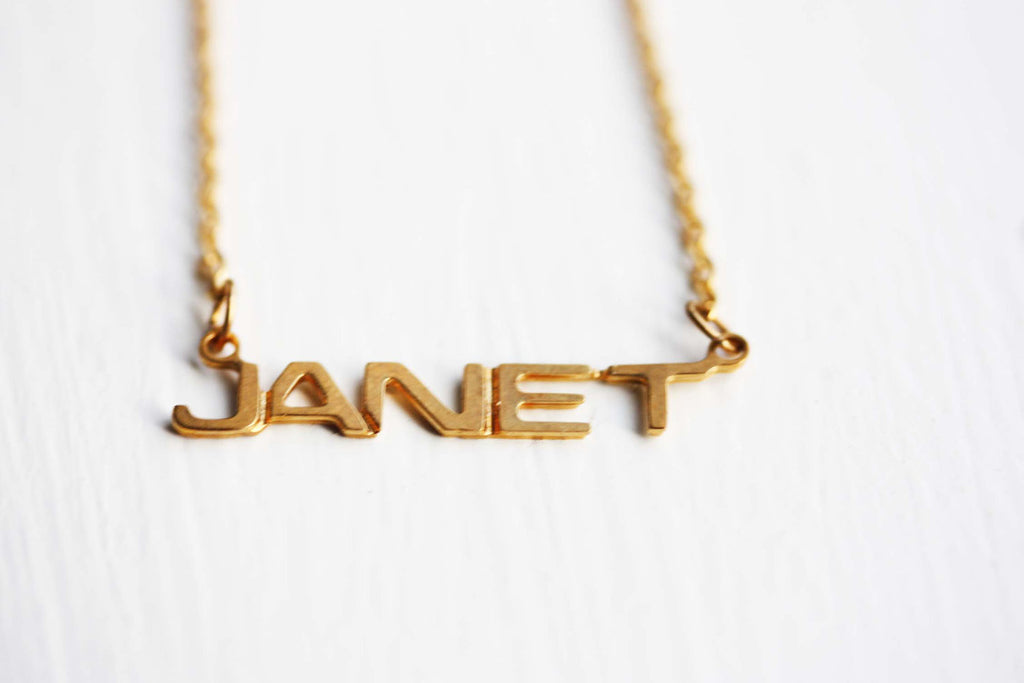 Vintage Janet gold name necklace from Diament Jewelry, a gift shop in Washington, DC.