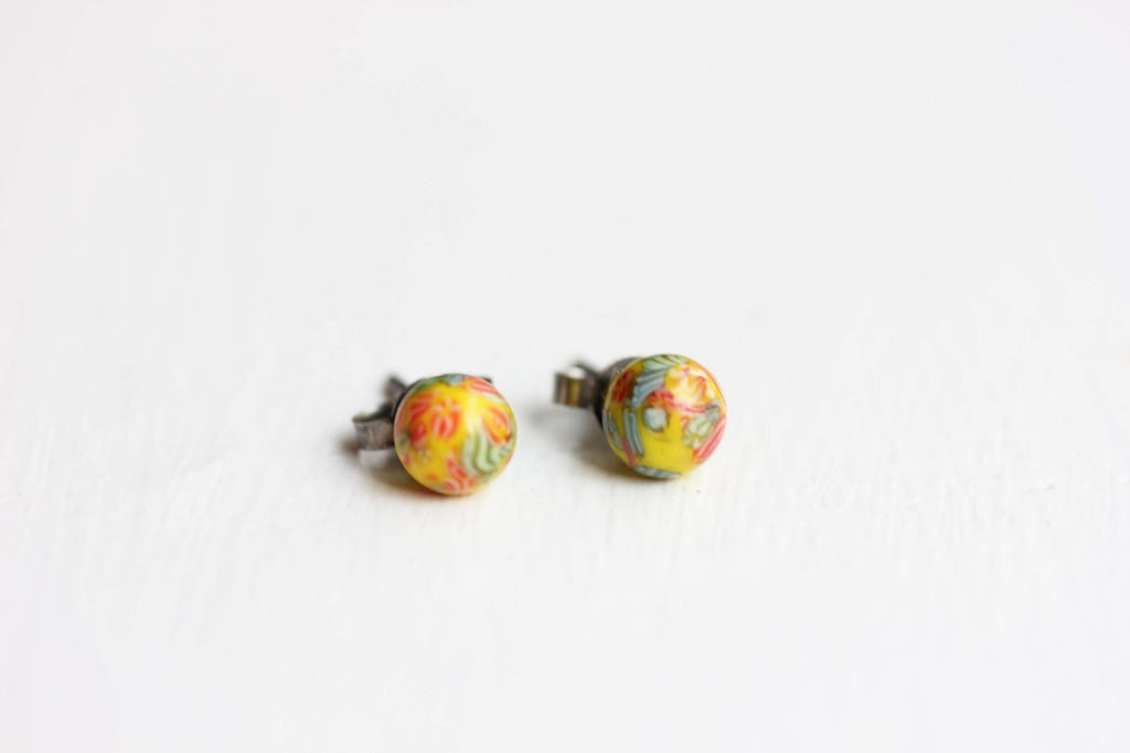 Vintage Japanese yellow confetti studs from Diament Jewelry, a gift shop in Washington, DC.