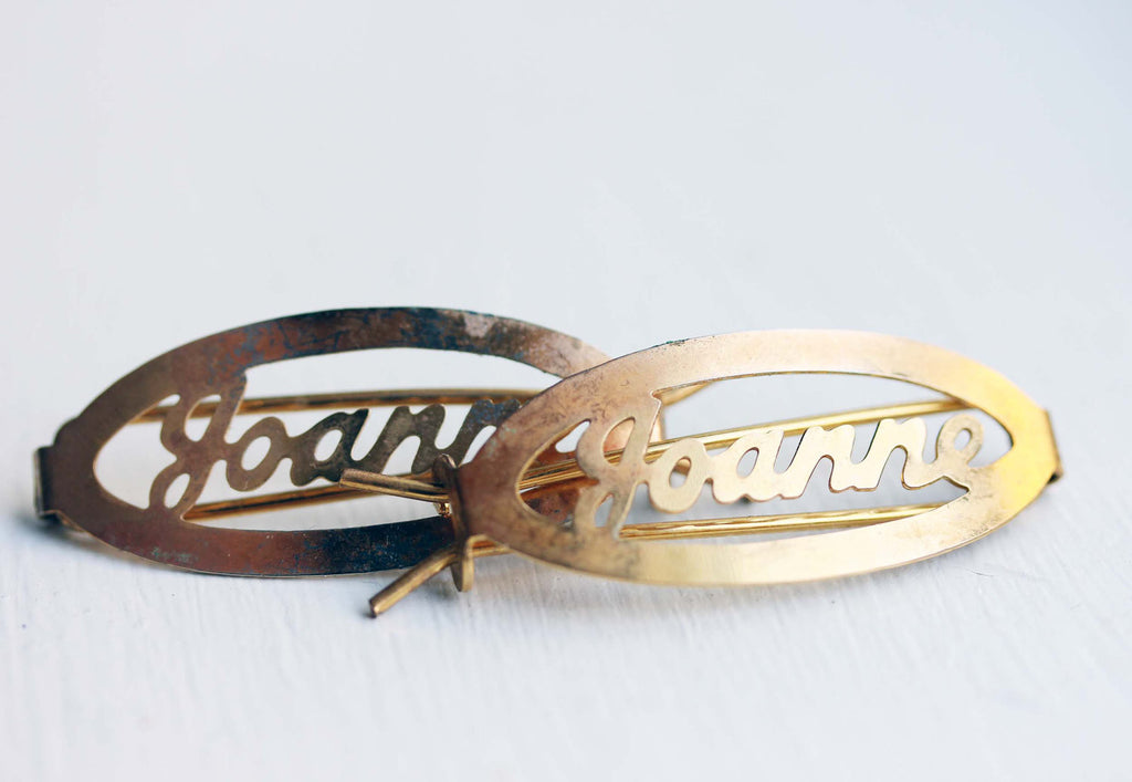 Vintage Joanne gold hair clips from Diament Jewelry, a gift shop in Washington, DC.