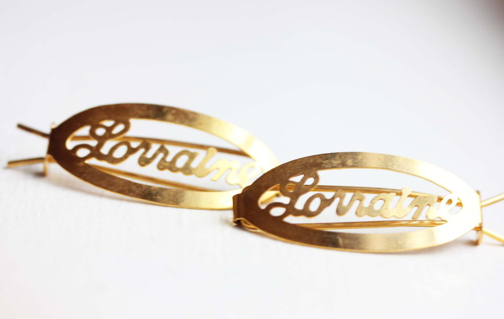 Vintage Lorraine gold hair clips from Diament Jewelry, a gift shop in Washington, DC.