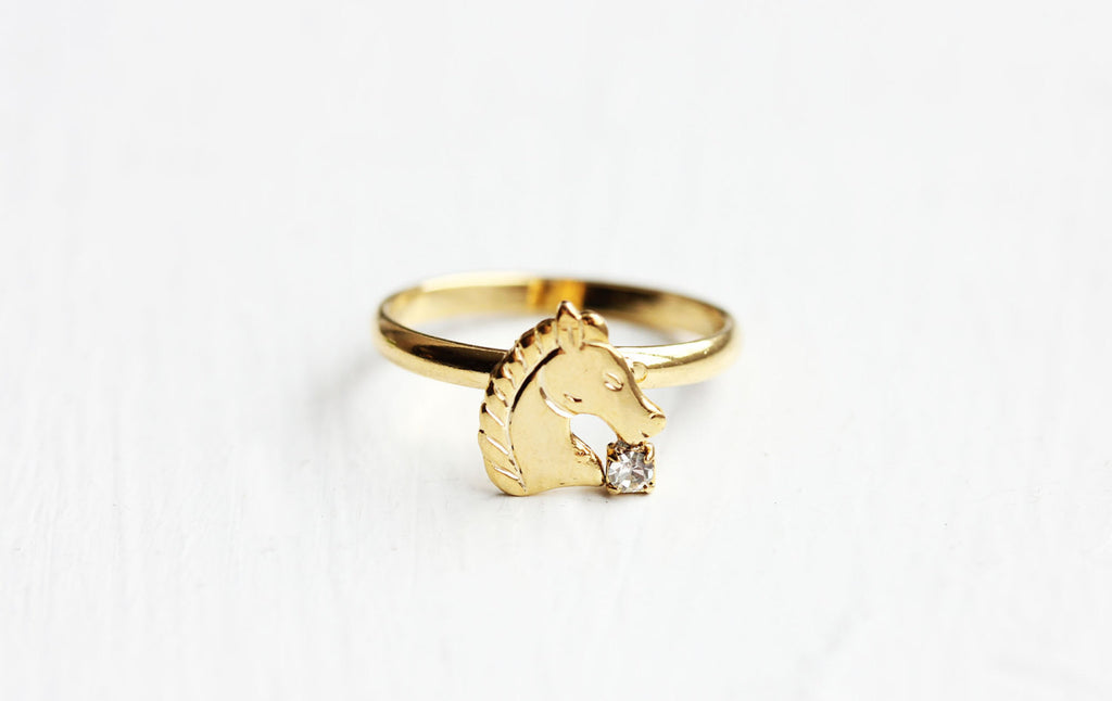 Gold horse ring from Diament Jewelry, a gift shop in Washington, DC.