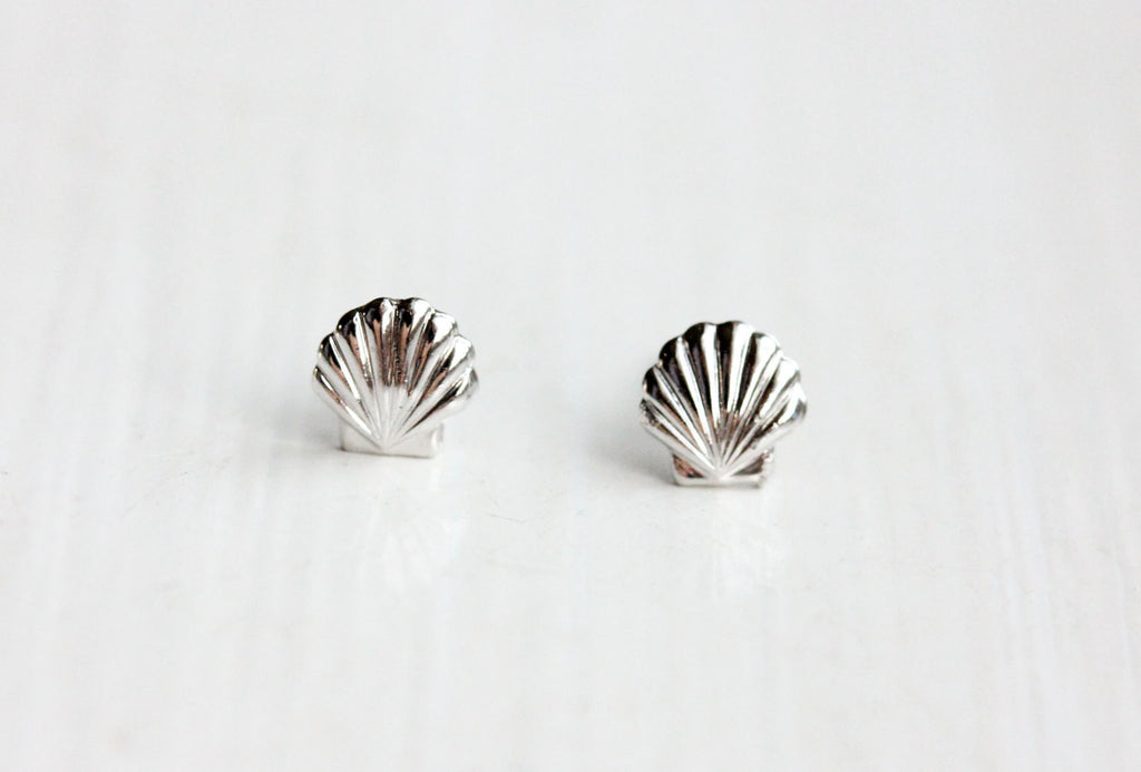 Silver shell studs from Diament Jewelry, a gift shop in Washington, DC.