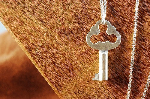Small silver key necklace from Diament Jewelry, a gift shop in Washington, DC.