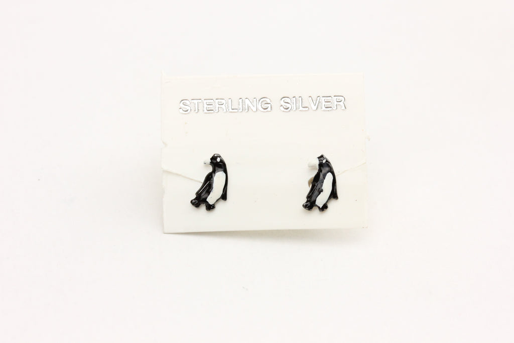 Sterling silver penguin studs from Diament Jewelry, a gift shop in Washington, DC.