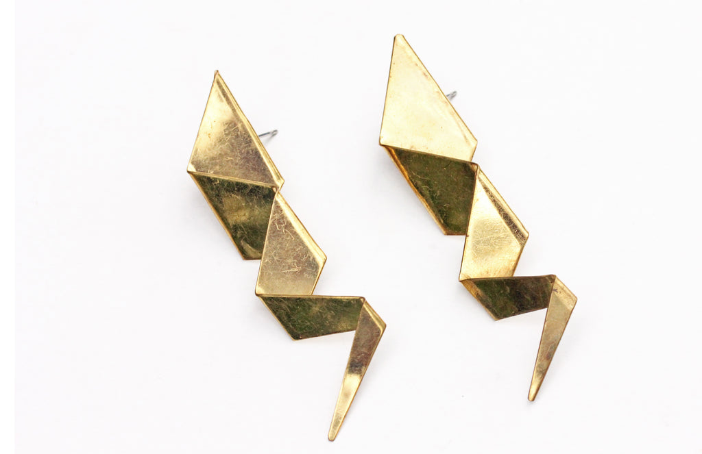 Gold zig zag earrings from Diament Jewelry, a gift shop in Washington, DC.