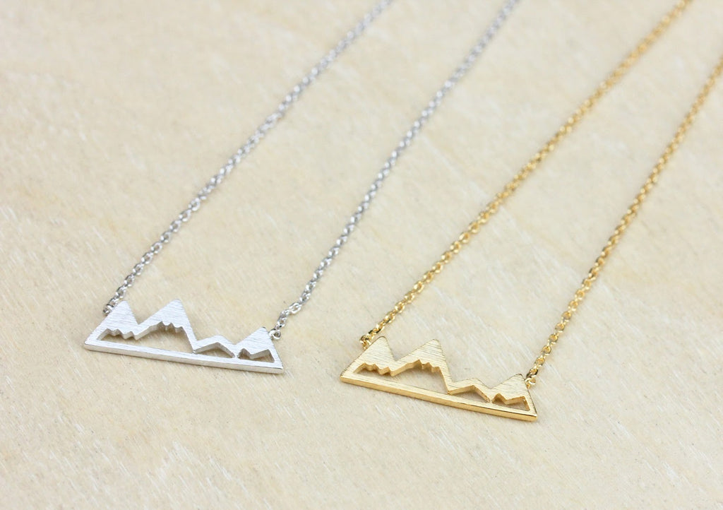Mountain charm necklace from Diament Jewelry, a gift shop in Washington, DC.