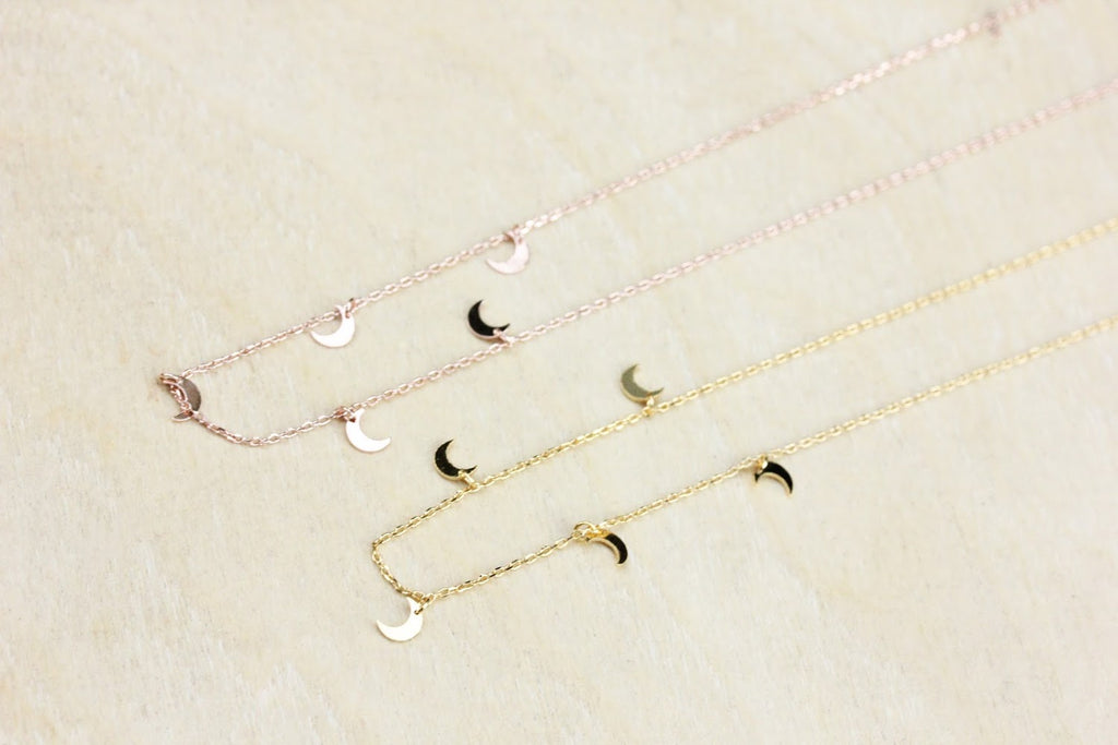 Moon charm necklace from Diament Jewelry, a gift shop in Washington, DC.