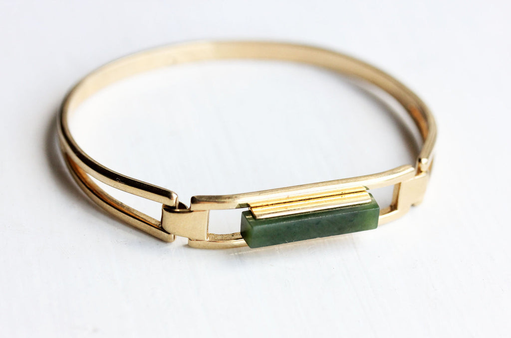 Gold and jade bar cuff bracelet from Diament Jewelry, a gift shop in Washington, DC.