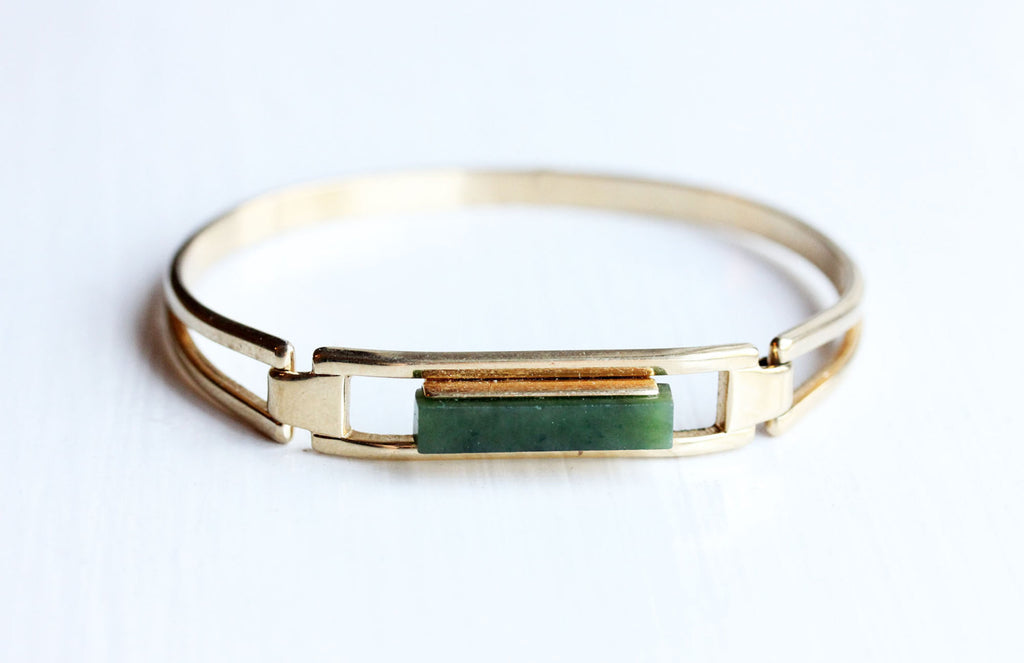 Gold and jade bar cuff bracelet from Diament Jewelry, a gift shop in Washington, DC.