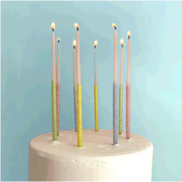 Tops Malibu Single Glitter Candles from Diament Jewelry, a gift shop in Washington, DC.