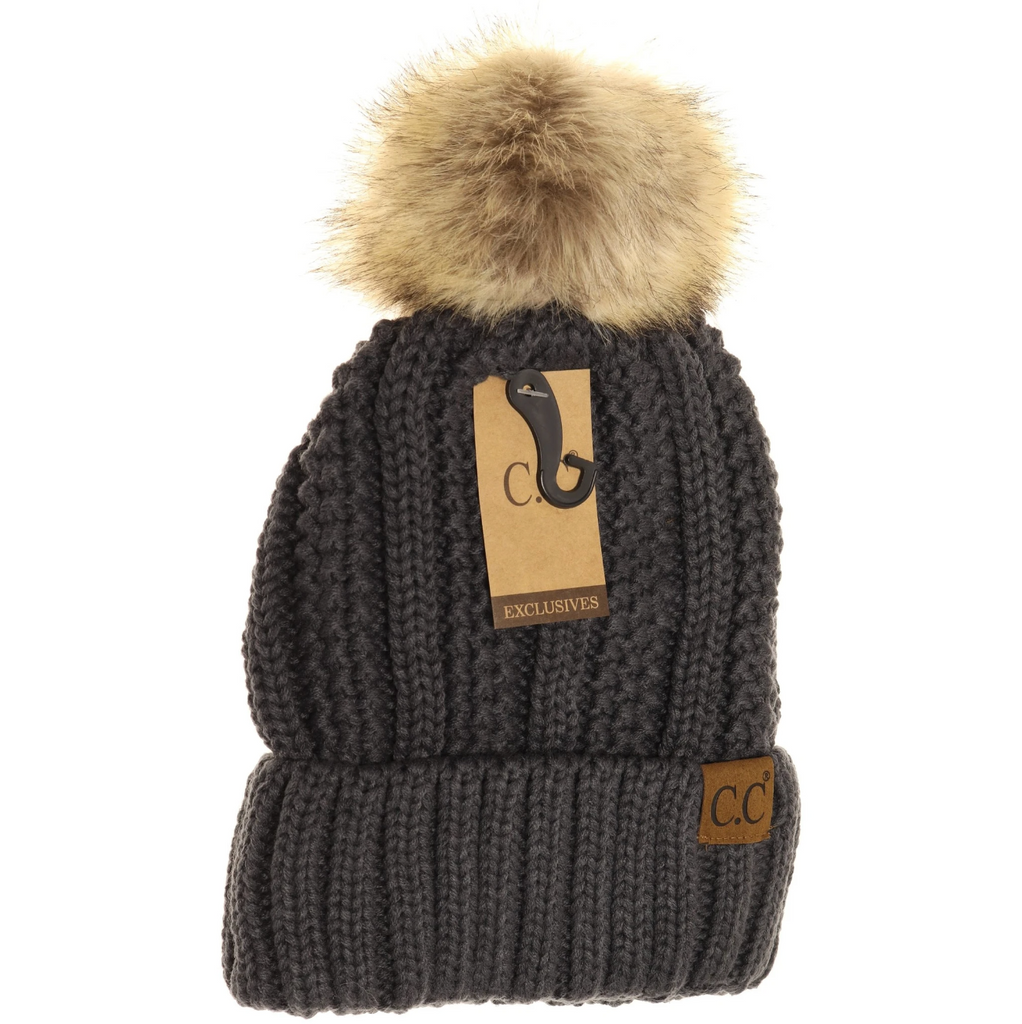 Charcoal Lined Cable Pom Beanie from Diament Jewelry, a gift shop in Washington, DC.