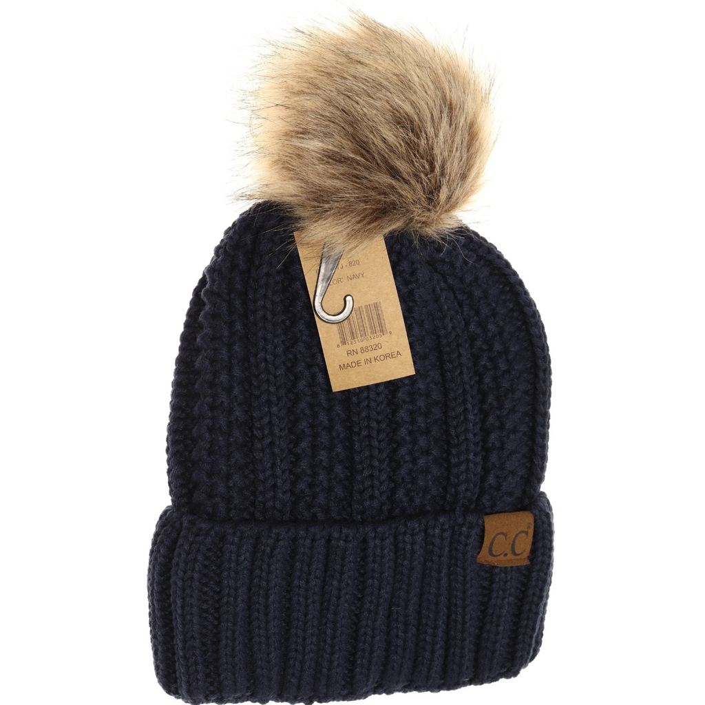 Navy Lined Cable Pom Beanie from Diament Jewelry, a gift shop in Washington, DC.