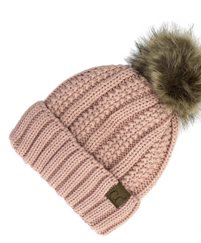 Rose Lined Cable Pom Beanie from Diament Jewelry, a gift shop in Washington, DC.