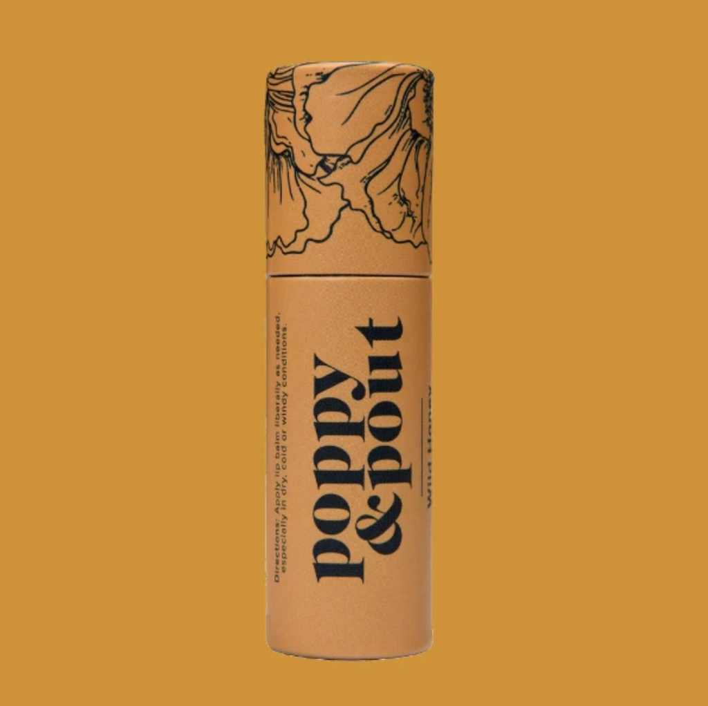 Poppy and Pout Wild Honey Lip Balm from Diament Jewelry, a gift shop in Washington, DC.