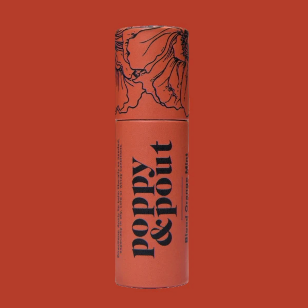 Poppy and Pout Blood Orange Mint Lip Balm from Diament Jewelry, a gift shop in Washington, DC.
