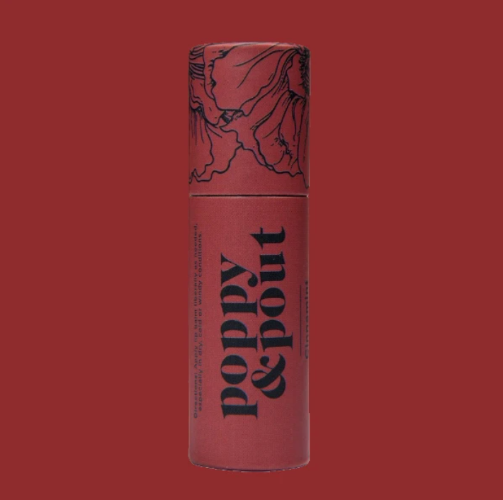 Poppy and Pout Cinnamint Lip Balm from Diament Jewelry, a gift shop in Washington, DC.