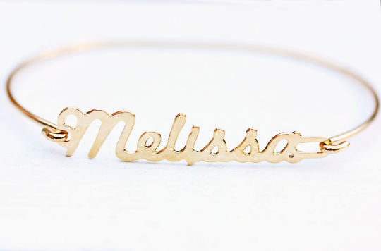 Vintage Melissa gold name bracelet from Diament Jewelry, a gift shop in Washington, DC.
