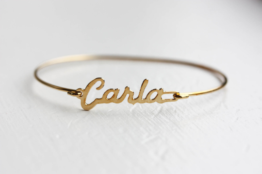 Vintage Carla gold name bracelet from Diament Jewelry, a gift shop in Washington, DC.