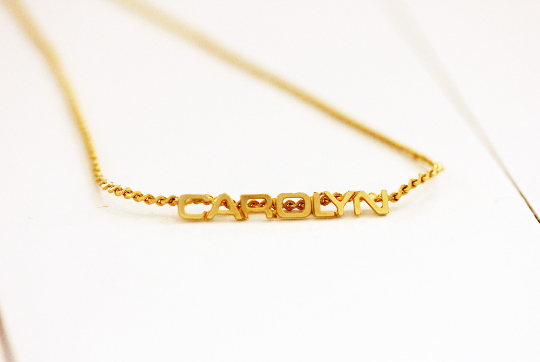 Vintage Carolyn gold name necklace from Diament Jewelry, a gift shop in Washington, DC.