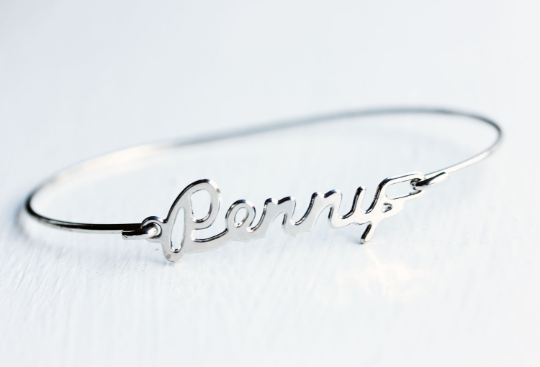 Vintage Penny silver name bracelet from Diament Jewelry, a gift shop in Washington, DC.