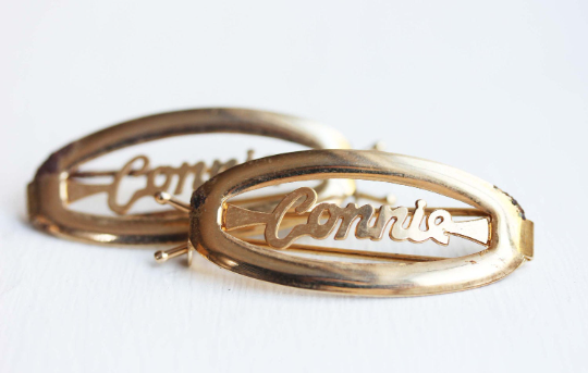 Vintage Connie gold hair clips from Diament Jewelry, a gift shop in Washington, DC.