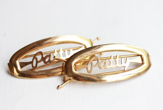 Vintage Patty gold hair clips from Diament Jewelry, a gift shop in Washington, DC.