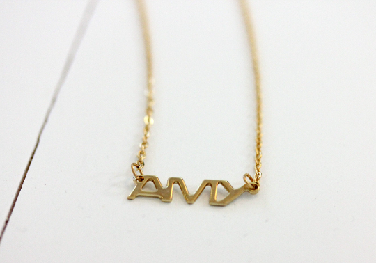 Vintage Amy gold name necklace from Diament Jewelry, a gift shop in Washington, DC.