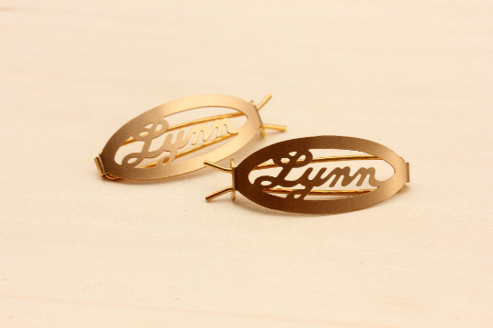 Vintage Lynn gold hair clips from Diament Jewelry, a gift shop in Washington, DC.