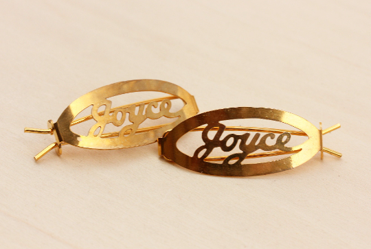 Vintage Joyce gold hair clips from Diament Jewelry, a gift shop in Washington, DC.