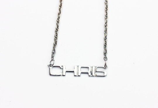 Vintage Chris silver name necklace from Diament Jewelry, a gift shop in Washington, DC.