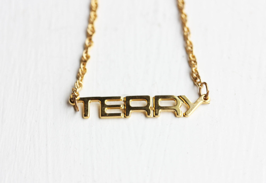 Vintage Terry gold name necklace from Diament Jewelry, a gift shop in Washington, DC.