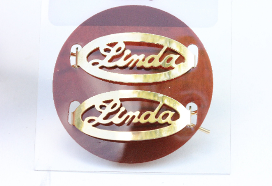 Vintage Linda gold hair clips from Diament Jewelry, a gift shop in Washington, DC.
