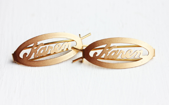 Vintage Karen gold hair clips from Diament Jewelry, a gift shop in Washington, DC.