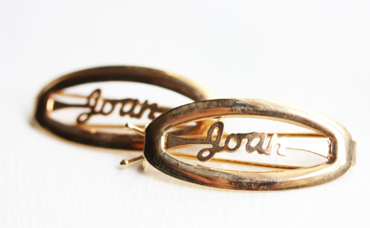 Vintage Joan gold hair clips from Diament Jewelry, a gift shop in Washington, DC.