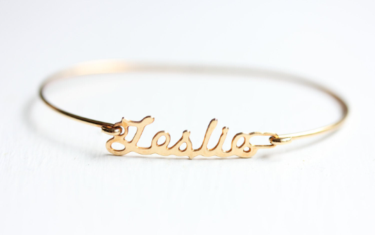 Vintage Leslie gold name bracelet from Diament Jewelry, a gift shop in Washington, DC.