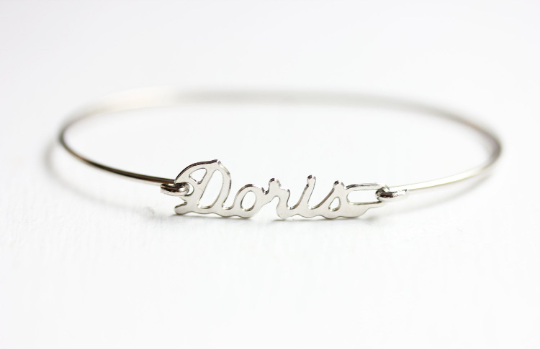 Vintage Doris silver name bracelet from Diament Jewelry, a gift shop in Washington, DC.