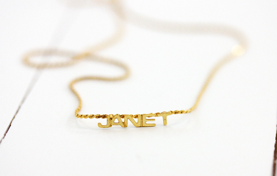 Vintage Janet gold name necklace from Diament Jewelry, a gift shop in Washington, DC.