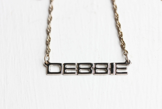 Vintage Debbie silver name necklace from Diament Jewelry, a gift shop in Washington, DC.