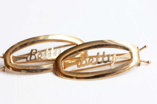 Vintage Betty gold hair clips from Diament Jewelry, a gift shop in Washington, DC.
