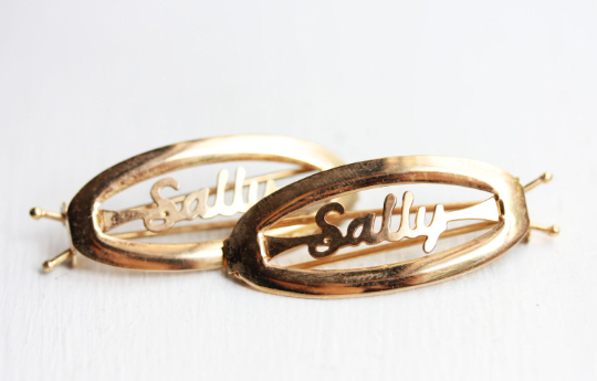 Vintage Sally gold hair clips from Diament Jewelry, a gift shop in Washington, DC.